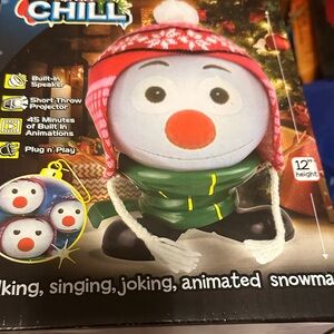 Snowman Toy with Red Hat and Green Scarf